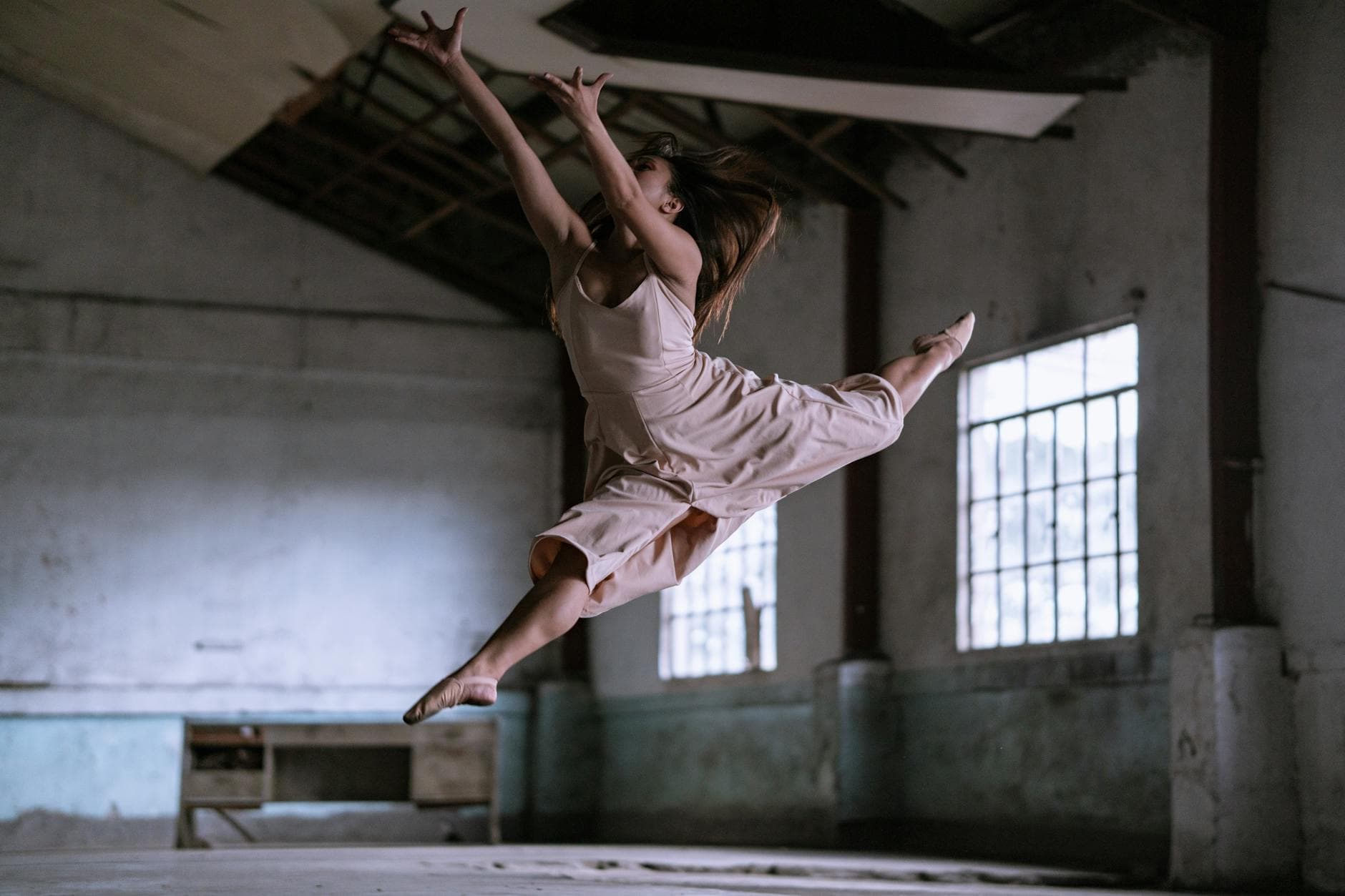 Contemporary dancer mid-leap
